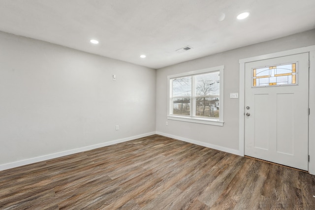 entrance foyer featuring dark hardwood / wood-style floors