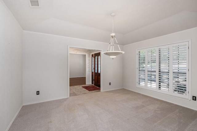 unfurnished room featuring crown molding and light colored carpet