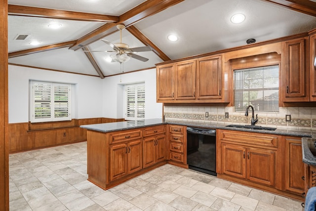 kitchen featuring sink, vaulted ceiling with beams, black dishwasher, kitchen peninsula, and a wealth of natural light