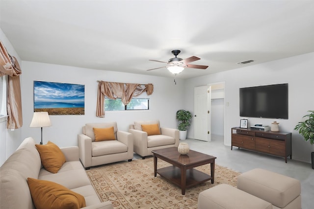 living room featuring ceiling fan