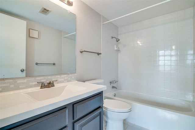 full bathroom with toilet, shower / bath combination, vanity, tasteful backsplash, and tile patterned floors