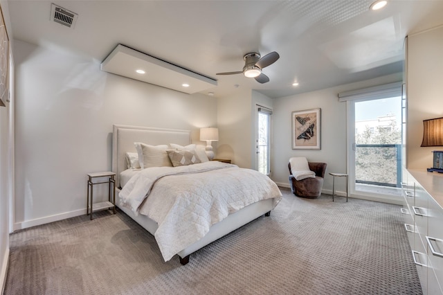 carpeted bedroom with ceiling fan