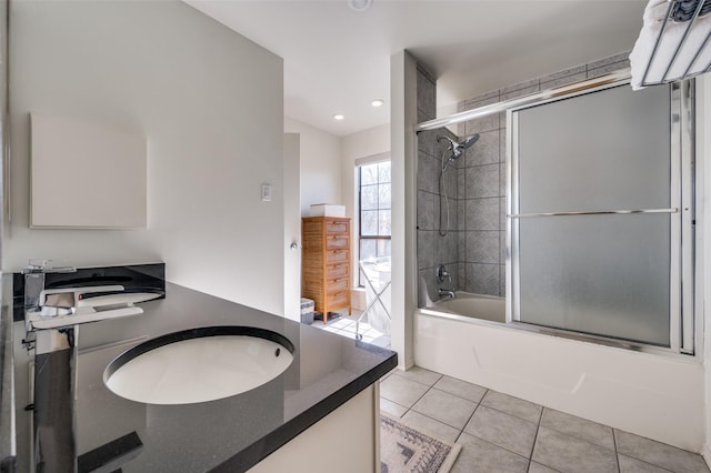 bathroom with vanity, tile patterned floors, and shower / bath combination with glass door