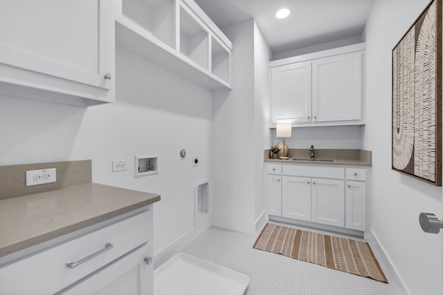 laundry room with gas dryer hookup, sink, cabinets, hookup for a washing machine, and electric dryer hookup