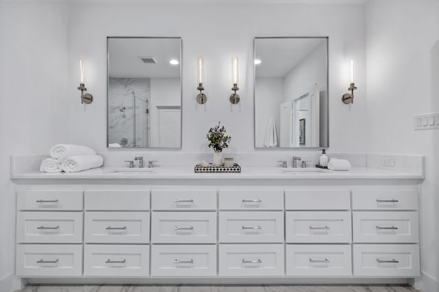 bathroom featuring vanity and walk in shower