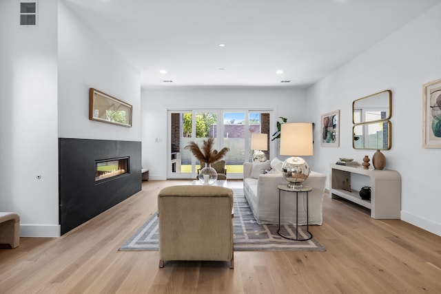 living room with light wood-type flooring