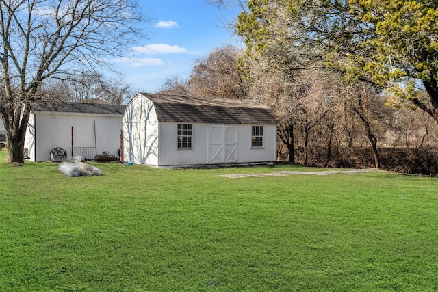 view of outdoor structure with a yard