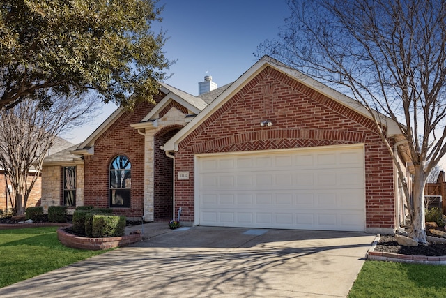 front of property with a garage