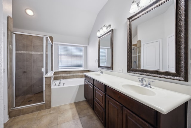 bathroom featuring tile patterned flooring, plus walk in shower, lofted ceiling, and vanity