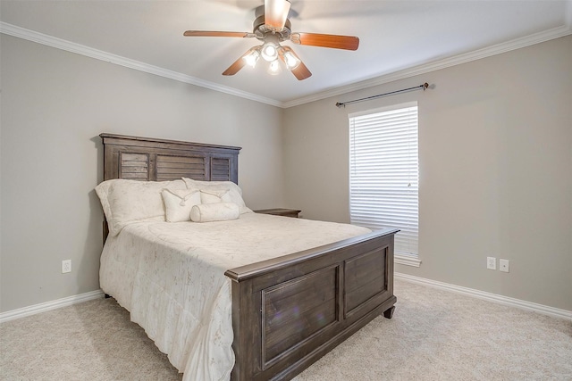 carpeted bedroom featuring ceiling fan and ornamental molding