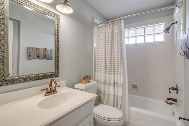 full bathroom featuring vanity, toilet, and shower / bath combo