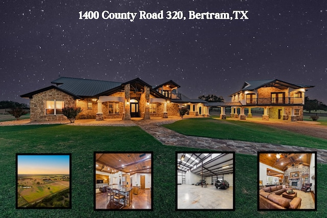 back house at night with a yard and a patio area