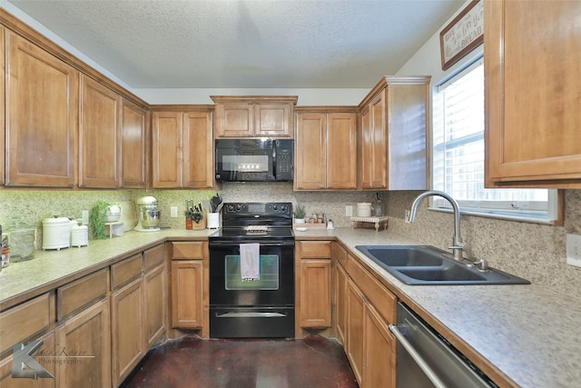 kitchen with tasteful backsplash, sink, black appliances, and a textured ceiling