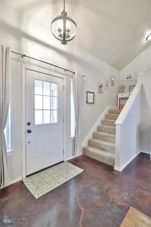 foyer with vaulted ceiling