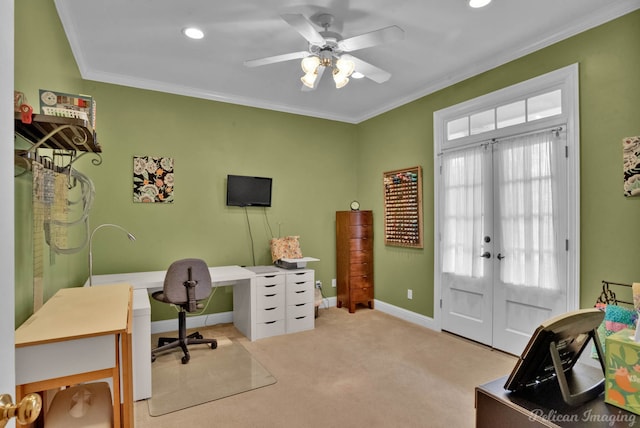 office space featuring crown molding, light colored carpet, ceiling fan, and french doors