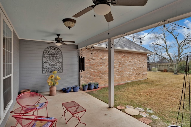 view of patio featuring ceiling fan