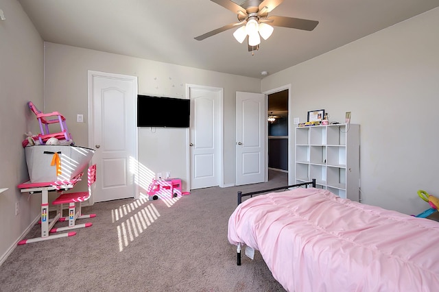 bedroom featuring ceiling fan and carpet flooring