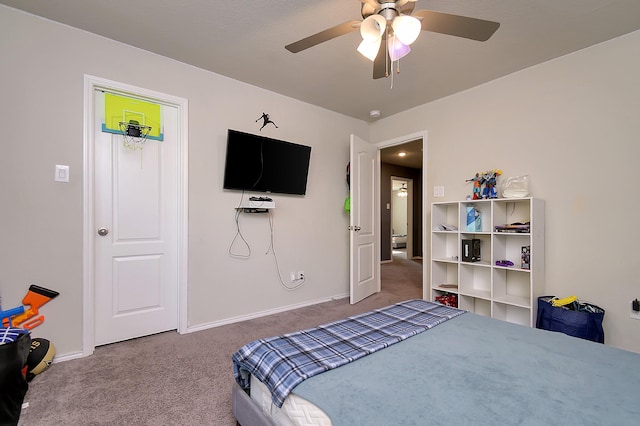 carpeted bedroom with ceiling fan