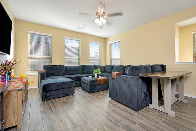 living room featuring ceiling fan