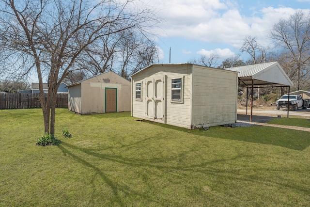 view of outdoor structure featuring a carport and a lawn