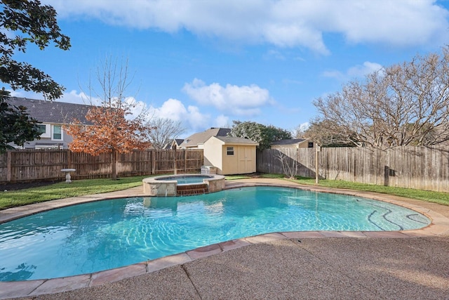 view of pool featuring an in ground hot tub and a storage shed