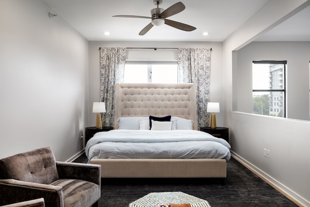 bedroom featuring a ceiling fan, recessed lighting, multiple windows, and baseboards