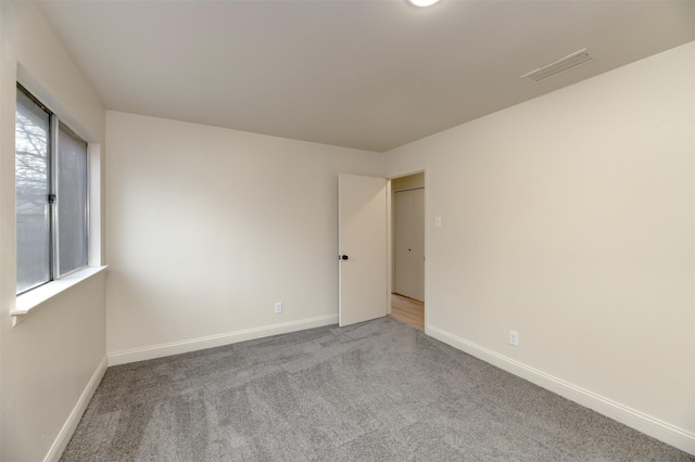 view of carpeted spare room