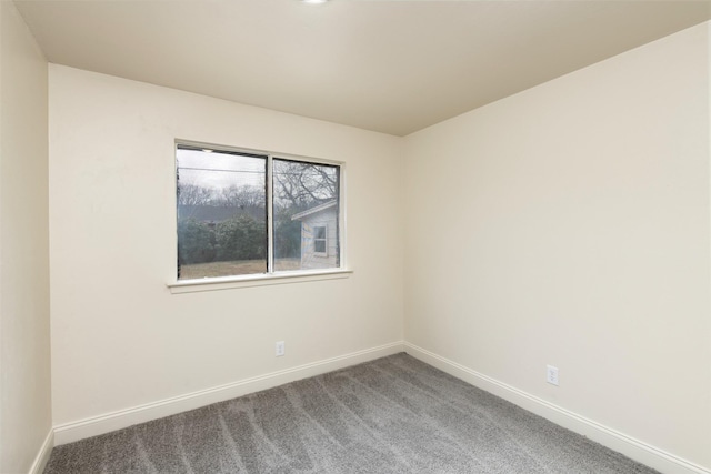 unfurnished room featuring carpet floors