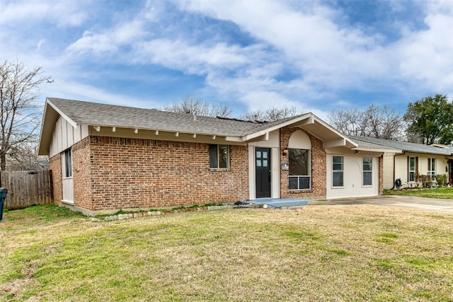 ranch-style house featuring a front lawn