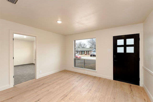 entrance foyer with light hardwood / wood-style floors