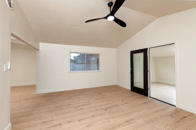 unfurnished bedroom with vaulted ceiling, a closet, ceiling fan, and light hardwood / wood-style flooring