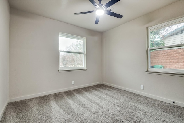 carpeted empty room with ceiling fan