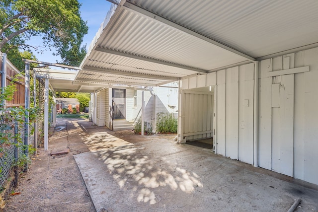 view of patio / terrace featuring a carport