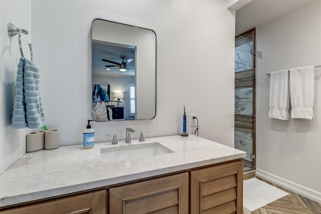 bathroom featuring parquet flooring, vanity, ornamental molding, an enclosed shower, and ceiling fan