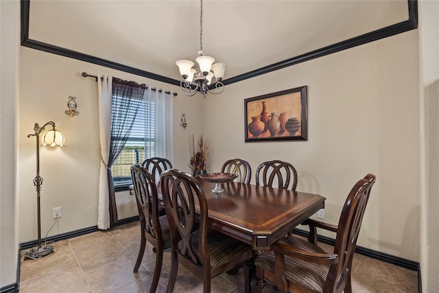 dining room featuring crown molding, light tile patterned flooring, and a notable chandelier