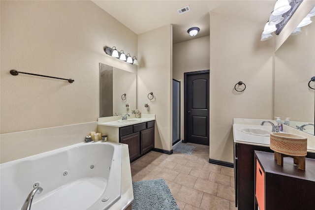 bathroom featuring vanity and a tub to relax in