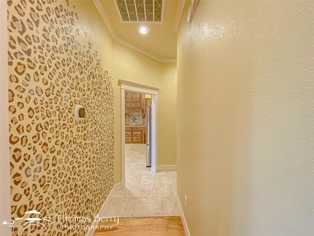 corridor featuring ornamental molding