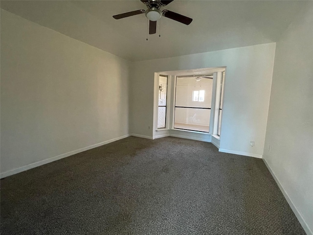 carpeted empty room with ceiling fan