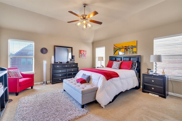 bedroom with lofted ceiling, carpet floors, and ceiling fan