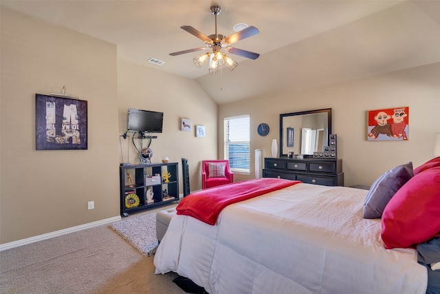 carpeted bedroom featuring lofted ceiling and ceiling fan