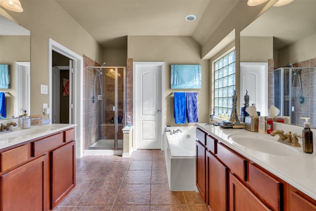 bathroom with vanity, tile patterned flooring, and independent shower and bath