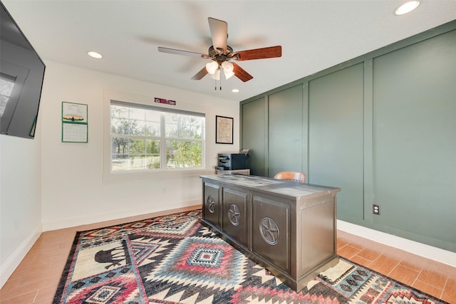 office area with ceiling fan and light hardwood / wood-style floors