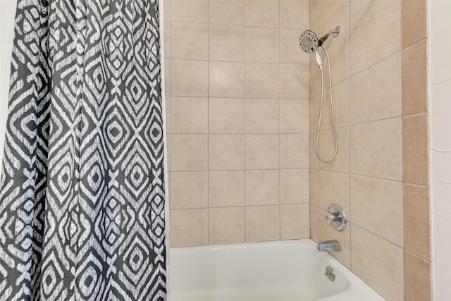 bathroom featuring shower / bath combination with curtain