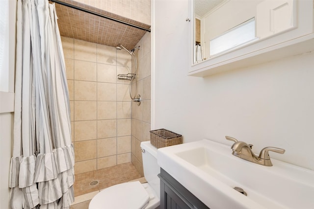 bathroom featuring vanity, toilet, and walk in shower