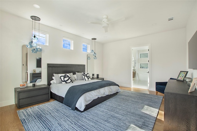 bedroom featuring hardwood / wood-style flooring and ceiling fan