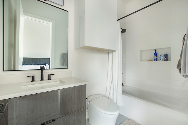 full bathroom featuring vanity, toilet, and shower / bath combo with shower curtain