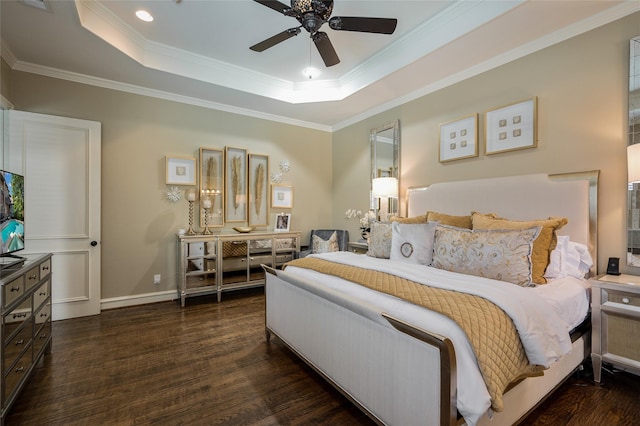 bedroom featuring crown molding, ceiling fan, dark hardwood / wood-style floors, and a raised ceiling