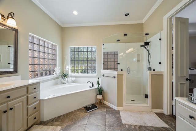 bathroom with vanity, crown molding, and plus walk in shower