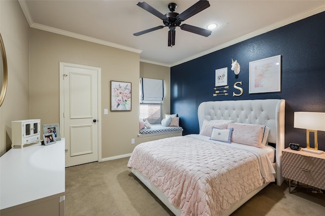 carpeted bedroom featuring ornamental molding and ceiling fan