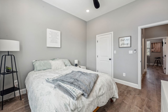 bedroom featuring dark hardwood / wood-style floors and ceiling fan